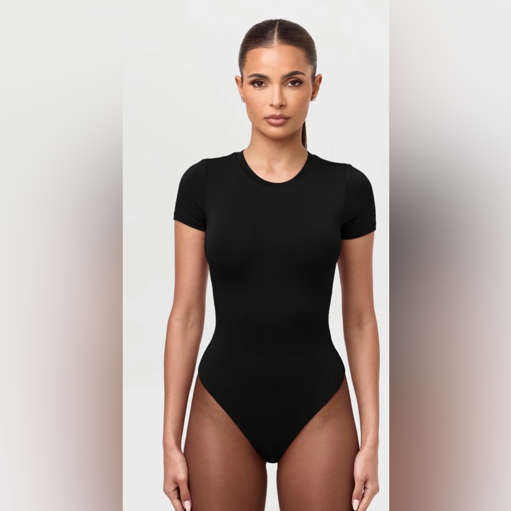 Naked Wardrobe SMOOTH CREWNECK TEE BODYSUIT Black Short Sleeve XS NWT